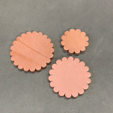 Leather Rosettes by the dozen